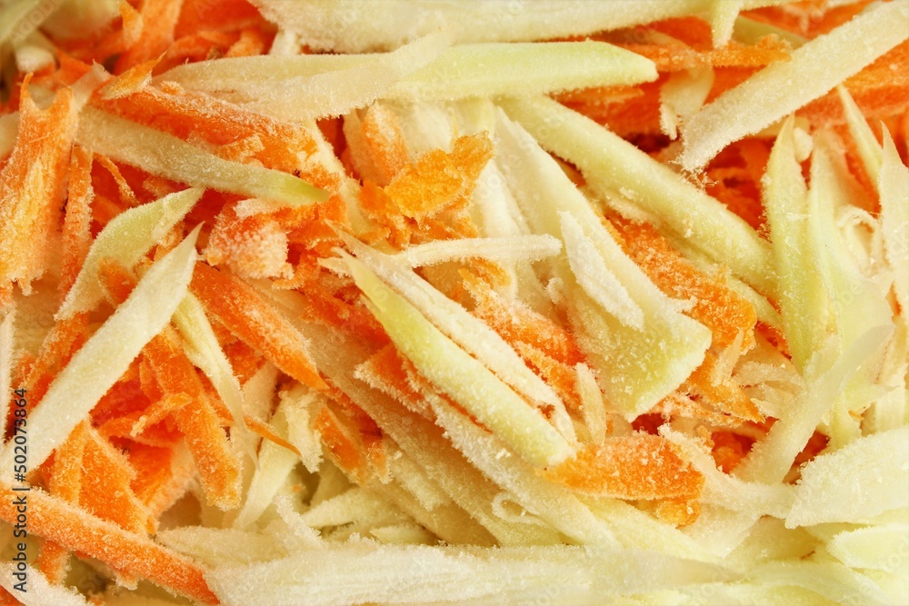 Frozen chopped papaya and carrot. full frame photo close up top view Frozen chopped papaya and carrot. full frame photo close up top view