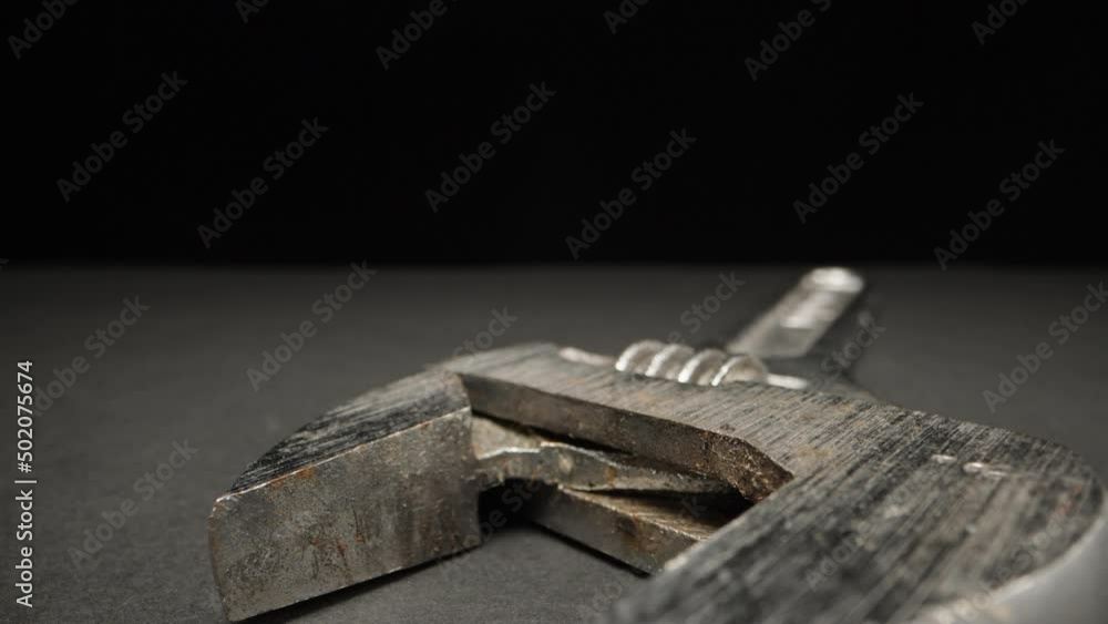 Adjustable wrench close-up. Dolly slider extreme close-up. Laowa Probe Adjustable wrench close-up. Dolly slider extreme close-up. Laowa Probe