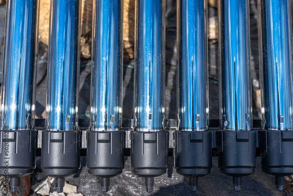 Φωτογραφία A modern pressure collector for heating domestic hot water, close-up on the ends of a vacuum tube