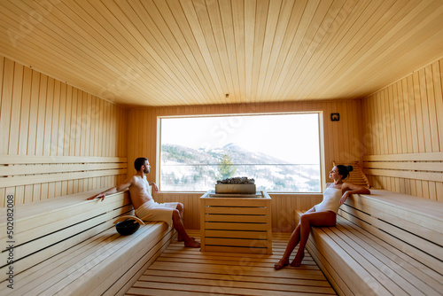 Young couple relaxing in th...