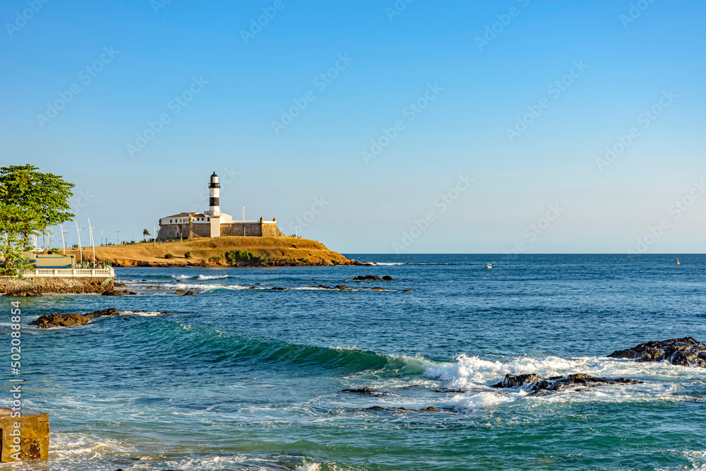 View of the famous lighthouse in the all saints bay in the city of Salvador, Bahia