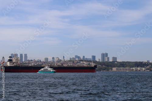 A transport ship passes through the Bosphorus