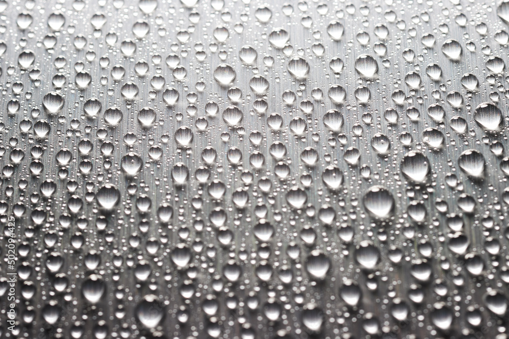 Gray flat metallic surface with drops of water. Abstract background of metal texture Gray flat metallic surface with drops of water. Abstract background of metal texture