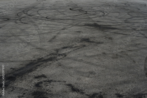 Wallpaper Mural Asphalt texture with white line and tire marks. Smooth asphalt road. Tarmac dark grey grainy road background.Top view Torontodigital.ca