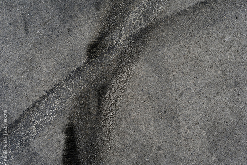 Wallpaper Mural Asphalt texture with white line and tire marks. Smooth asphalt road. Tarmac dark grey grainy road background.Top view Torontodigital.ca