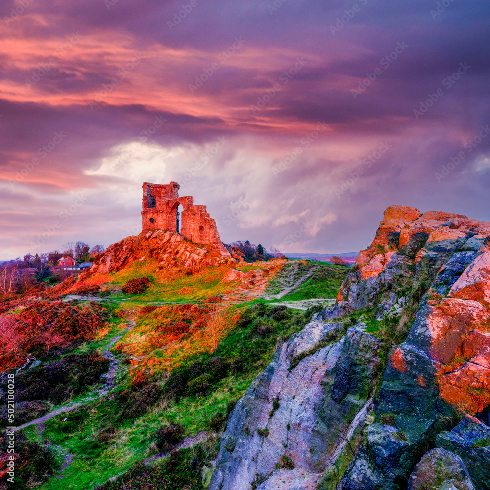 Fototapeta premium Winter golden hour light on Mow Cop Castle folly, Cheshire, UK