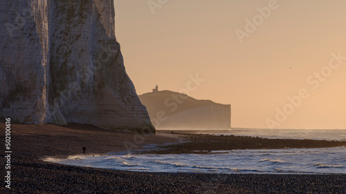 Mid-winter early morning light on the Seven Sisters and Belle Toute light house from Cuckmere Haven, East Sussex, UK photo