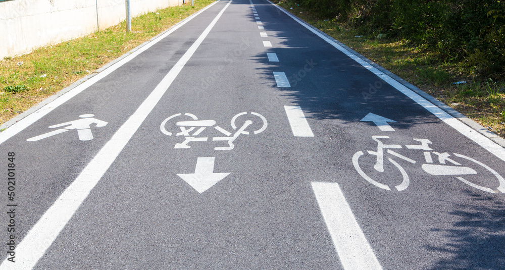 Fototapeta premium Cycle lane and pedestrian road signs