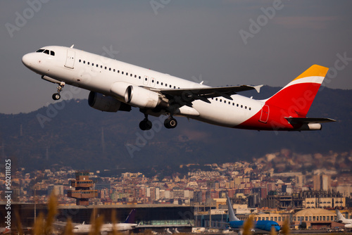 Airplane takes off from airport Barcelona. High quality photo