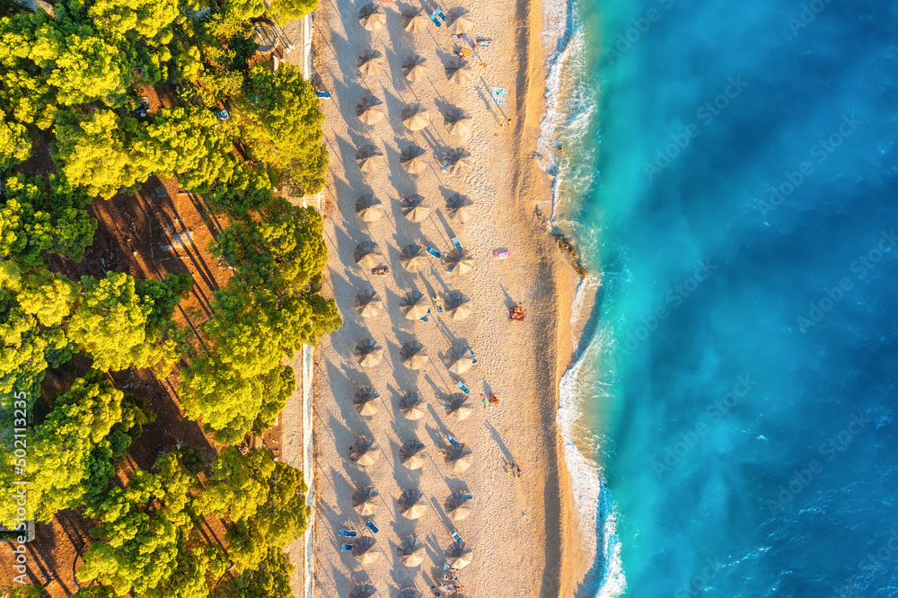 Mediterranean sea. Aerial view on the beach and people. Vacation and adventure. Beach and blue water. Top view from drone at beach and azure sea. Travel and relax - image