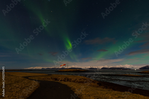 Beautiful northern lights in the wonderful evening of South Iceland