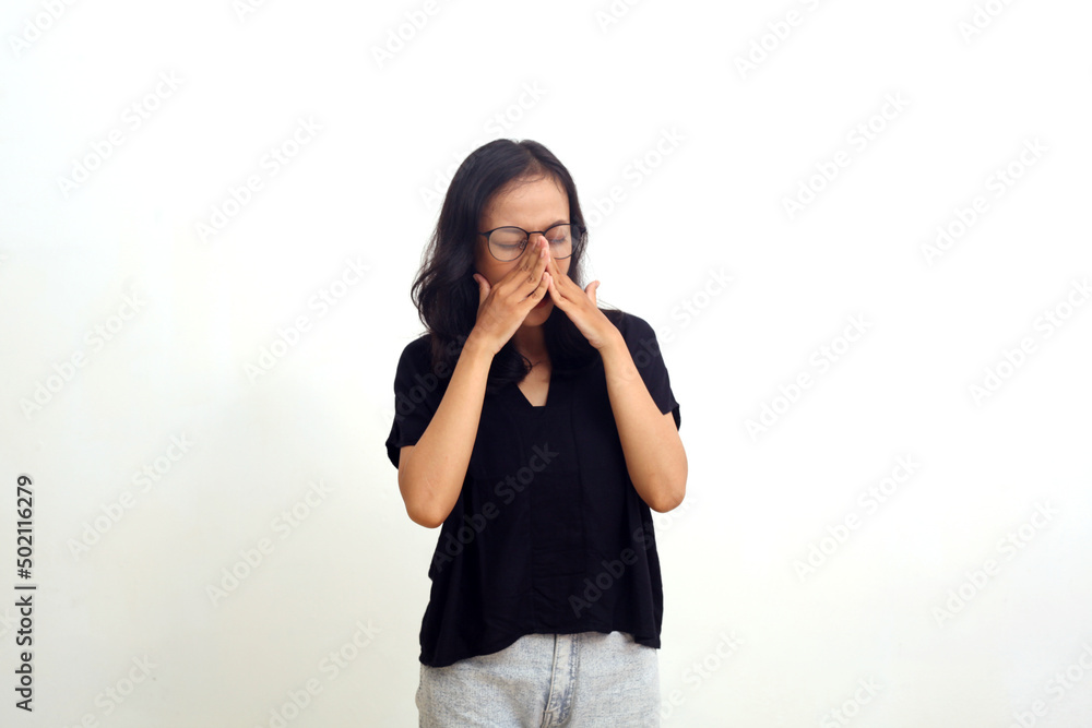 tired asian woman suffers from headache. isolated on white tired asian woman suffers from headache. isolated on white