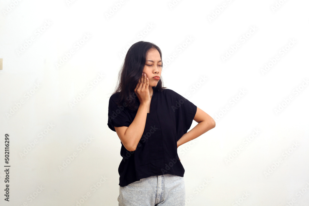 young asian women got toothache. isolated on white young asian women got toothache. isolated on white