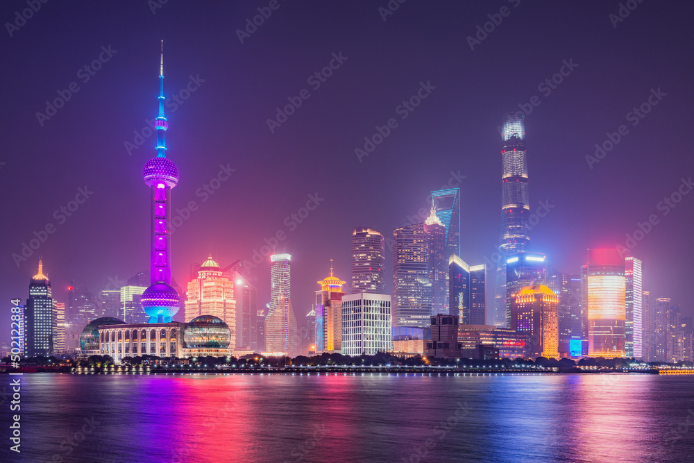 Shanghai evening city center skyline by the Huangpu River.