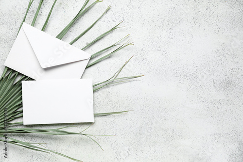 Blank white envelope and ca...