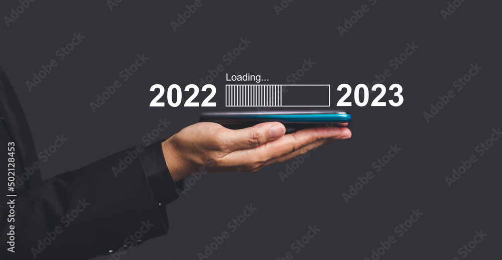 Countdown to 2023 concept. The virtual download bar with loading progress bar for New Year's Eve and changing the year 2022 to 2023 Countdown to 2023 concept. The virtual download bar with loading progress bar for New Year's Eve and changing the year 2022 to 2023