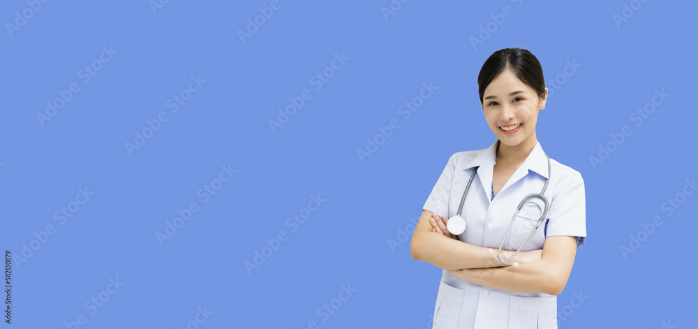 Beautiful Asian female doctor in uniform standing with arms crossed smiling on a white background with clipping path. Beautiful Asian female doctor in uniform standing with arms crossed smiling on a white background with clipping path.