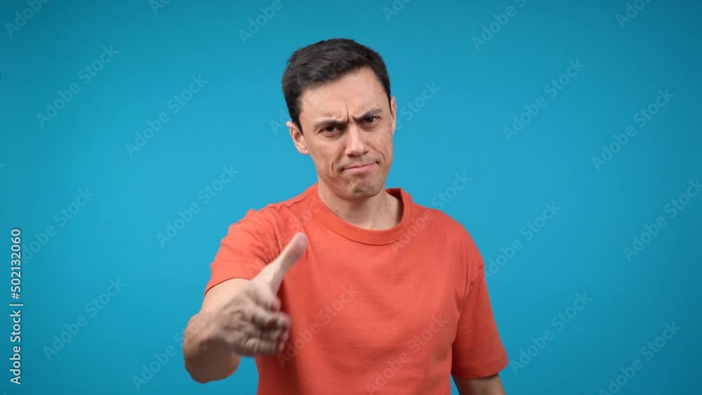 Sincere and honest man giving the hand. Blue background Sincere and honest man giving the hand. Blue background