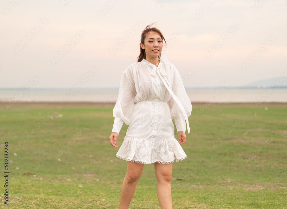 Happy young Asian women in bride clothing with veil Happy young Asian women in bride clothing with veil