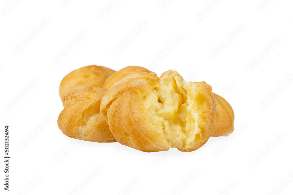 Cream puff with filling , isolated on white background