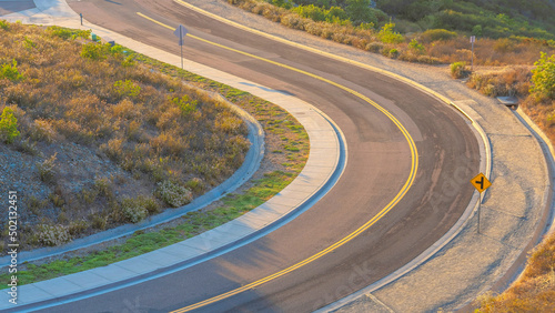 Panorama High angle view of a winding road with road intersection sign at San Diego, California