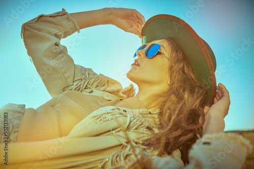 model in hippie style clothing photo