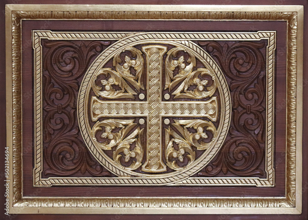 Christian gilded cross on a board, antique item.