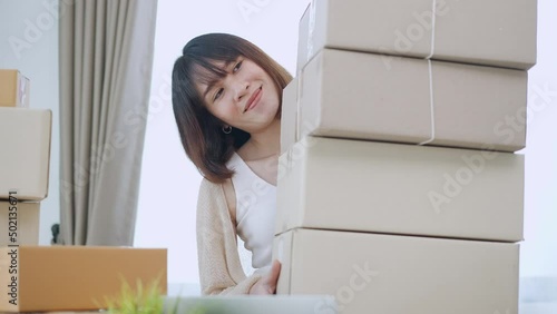 Happy female online selling at home, Startup project or small business enterprise.