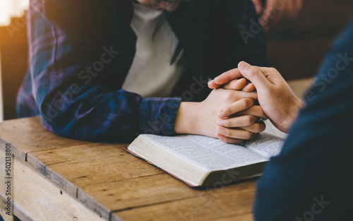 Fotografía A Group of Christians pray to bless and pray for each other in church