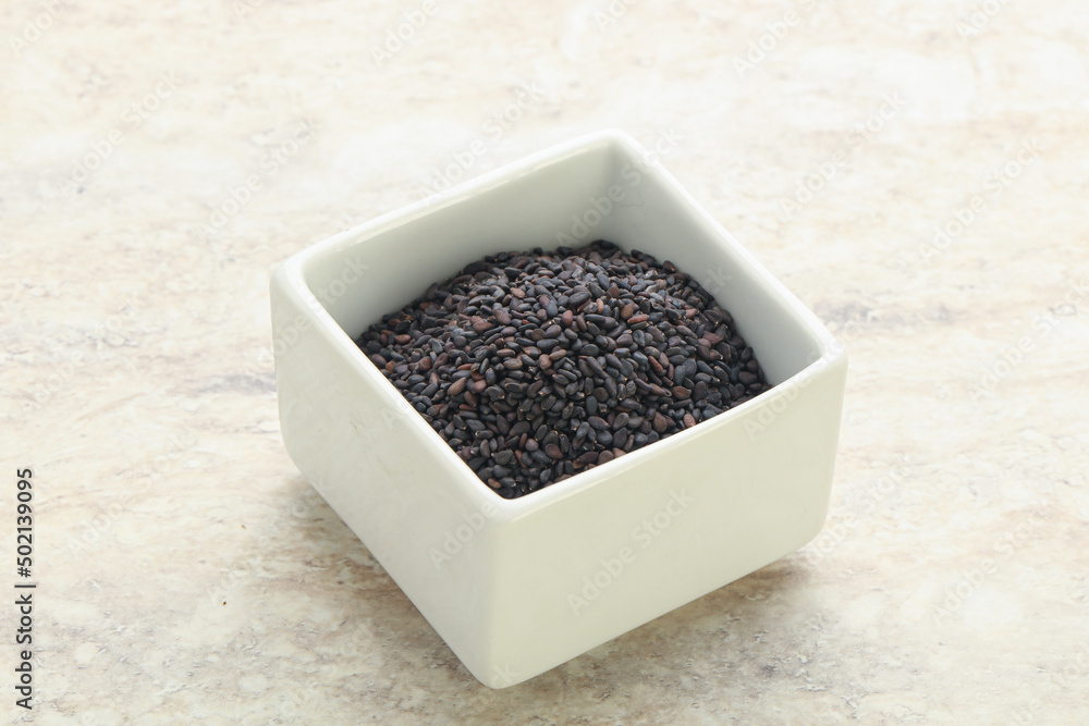 Black sesame seeds in the bowl Black sesame seeds in the bowl