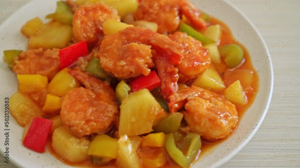 Stir-fried sweet and sour with fried shrimp on plate - Asian food style Stir-fried sweet and sour with fried shrimp on plate - Asian food style