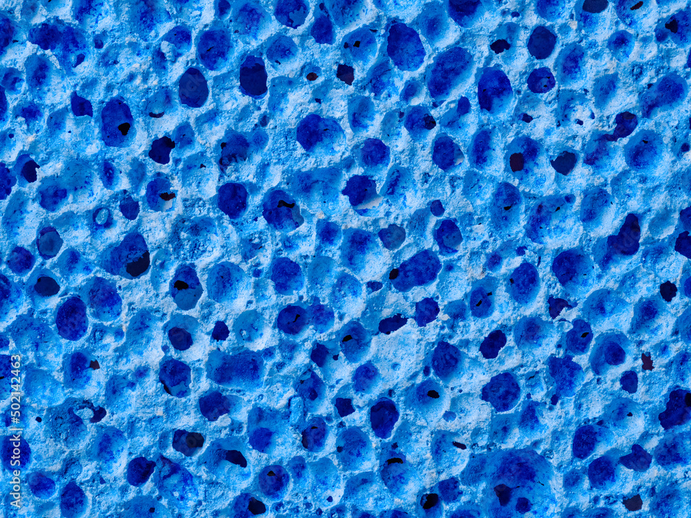 Pore pumice texture as blue abstract background Pore pumice texture as blue abstract background