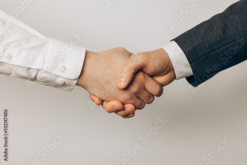 Wallpaper Mural business people shaking hands in office. 
business people shaking hands on white background Torontodigital.ca