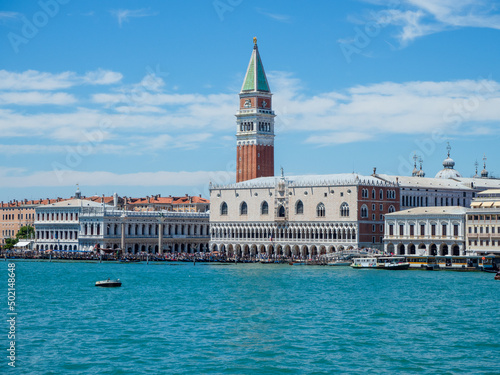 Doge's Palace and San Marco bell tower from the Grand Canal in Venice.