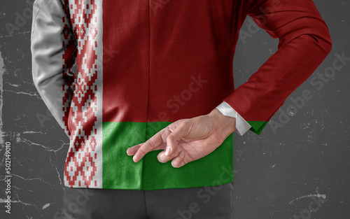 Jacket Flag of Belarus on Businessman with his fingers crossed behind his back