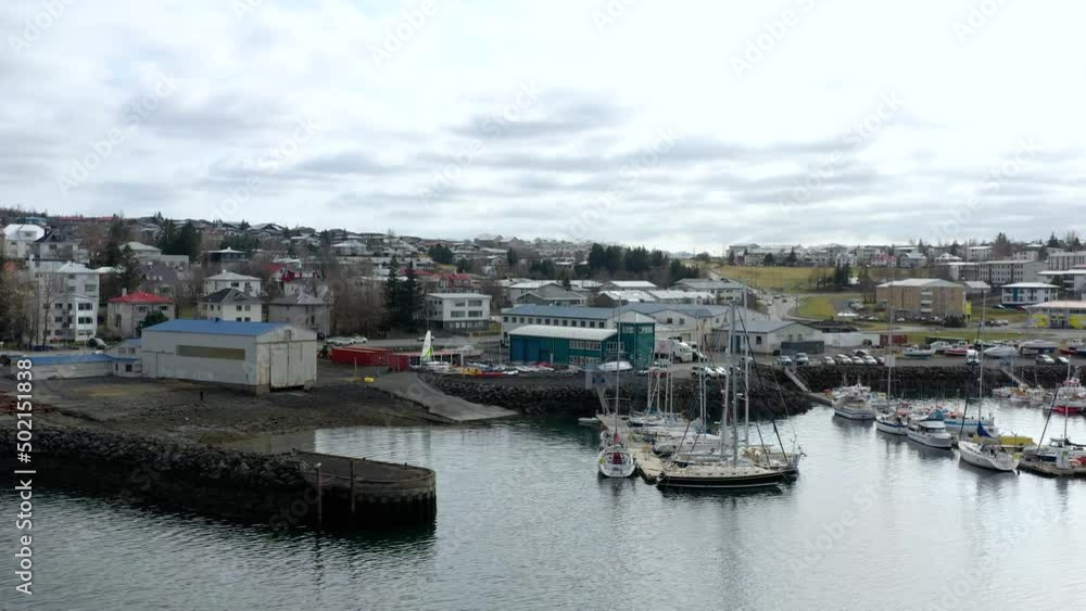 Hafnarfjordur Coastal Town And Marina At Daytime In Reykjavik, Iceland. - aerial Hafnarfjordur Coastal Town And Marina At Daytime In Reykjavik, Iceland. - aerial