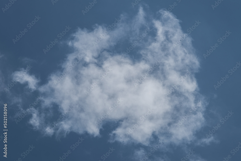 Fototapeta premium Croatia, May 01,2022: White cloud on clear blue sky background.