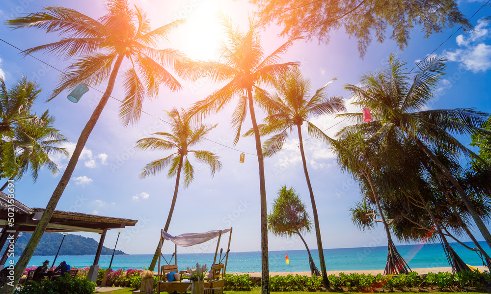 Fototapeta premium Amazing tropical paradise beach with swimming pools and coconut palms