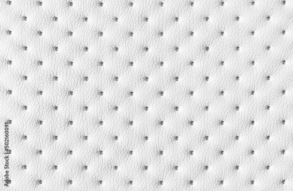 White dotted quilted leather soft background pattern White dotted quilted leather soft background pattern