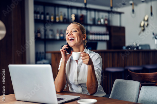 A woman talking on the phone.