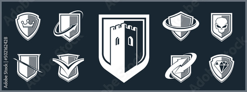 Classic shields shapes set with different additional elements vector symbols set, defense and safety icons, ammo emblems collection.