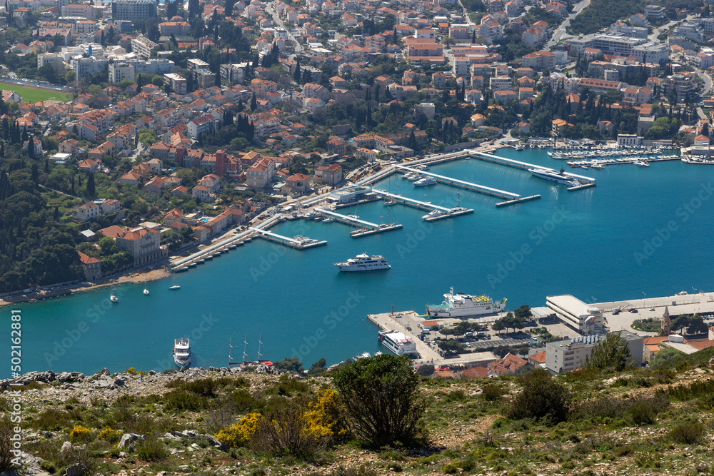 Aerial view of port of Dubrovnik with cruise ships and yachts, Adriatic sea.