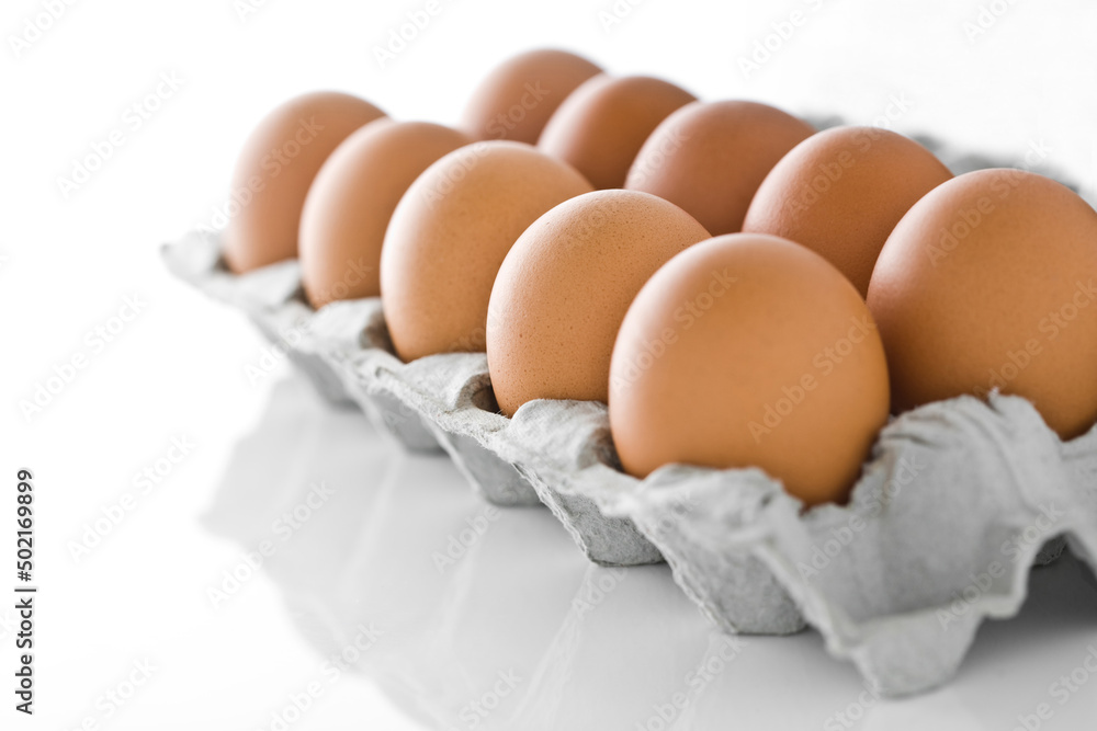 Egg in carton isolated on white. Egg in carton isolated on white.