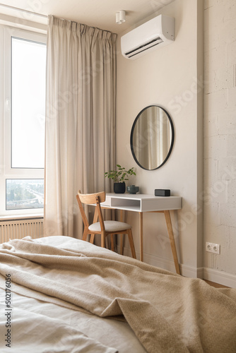 Canvas bedroom in white and beige tones, dressing table in the bedroom, bedroom interio