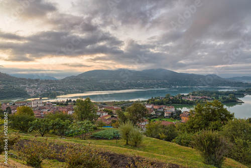 Beautiful Italian lake at sunrise. Aerial view of lake Annone or lake Oggiono with Civate in the foreground and in the background the section between towns of Sala Al Barro and Oggiono photo