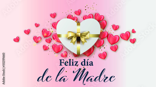 tarjeta o pancarta para el día de la madre con un regalo en forma de corazón con su cinta dorada de corazones rosas alrededor del regalo en un fondo degradado rosa y blanco