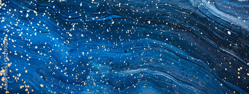 Fluid Art acrylic paints. Abstract mixing blue navi paint waves. Liquid golden flows splashes. Marble effect banner photo