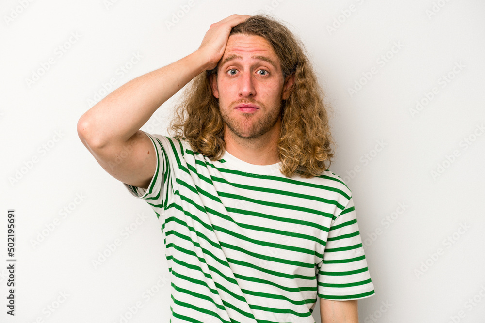 Young caucasian man isolated on white background being shocked, she has remembered important meeting. Young caucasian man isolated on white background being shocked, she has remembered important meeting.