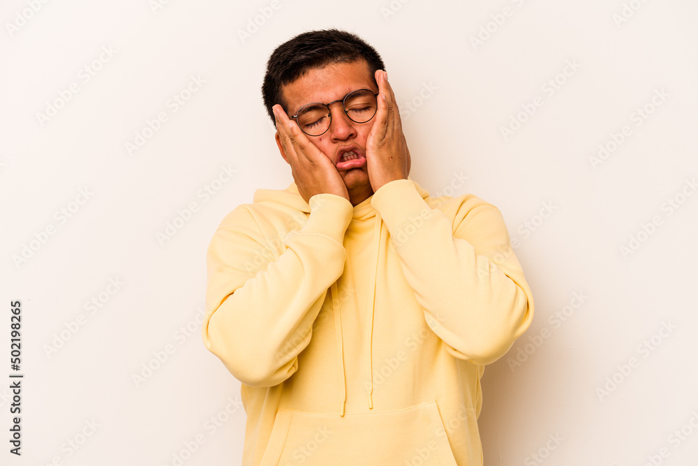 Young hispanic man isolated on white background whining and crying disconsolately. Young hispanic man isolated on white background whining and crying disconsolately.