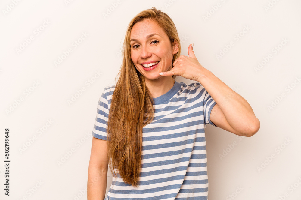 Young caucasian woman isolated on white background showing a mobile phone call gesture with fingers. Young caucasian woman isolated on white background showing a mobile phone call gesture with fingers.